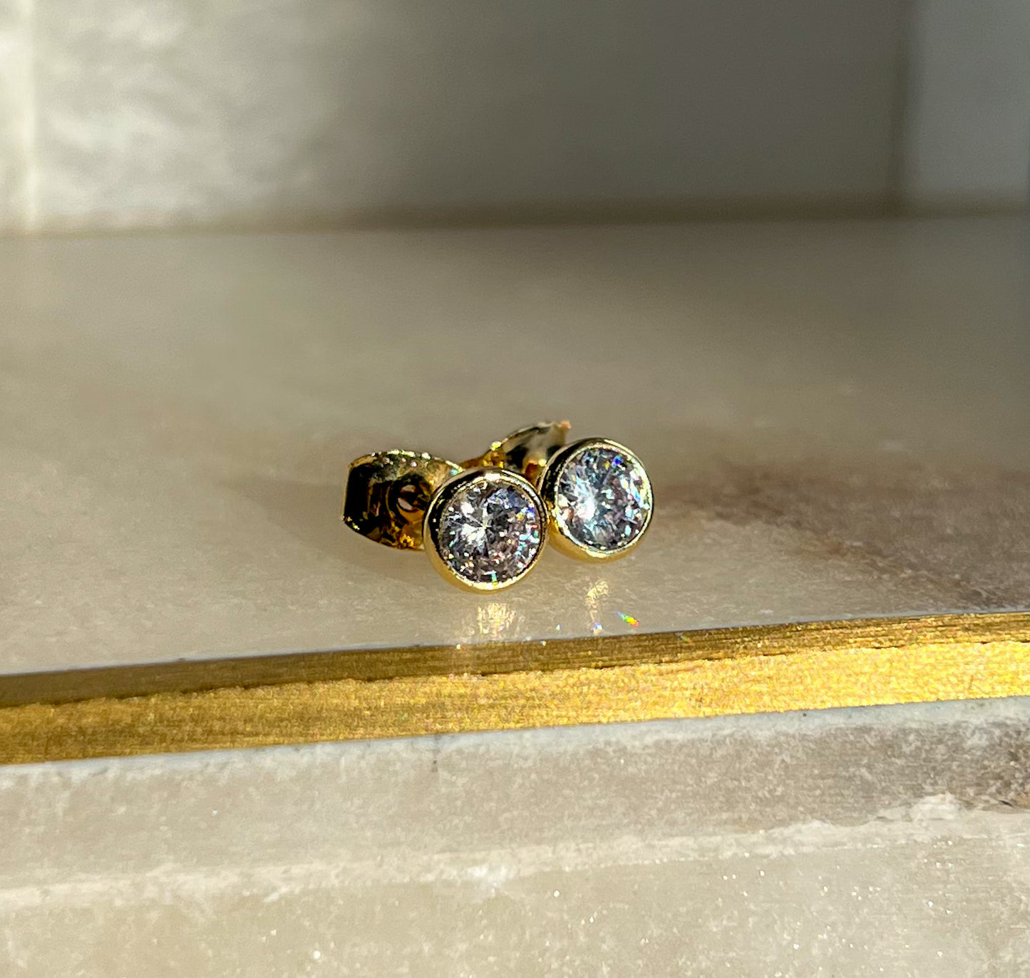 14k gold round diamond bezel stud earrings