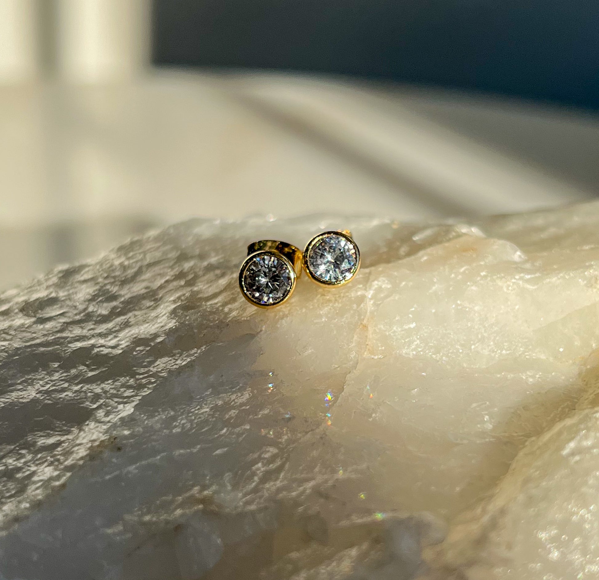 14k gold round diamond bezel stud earrings