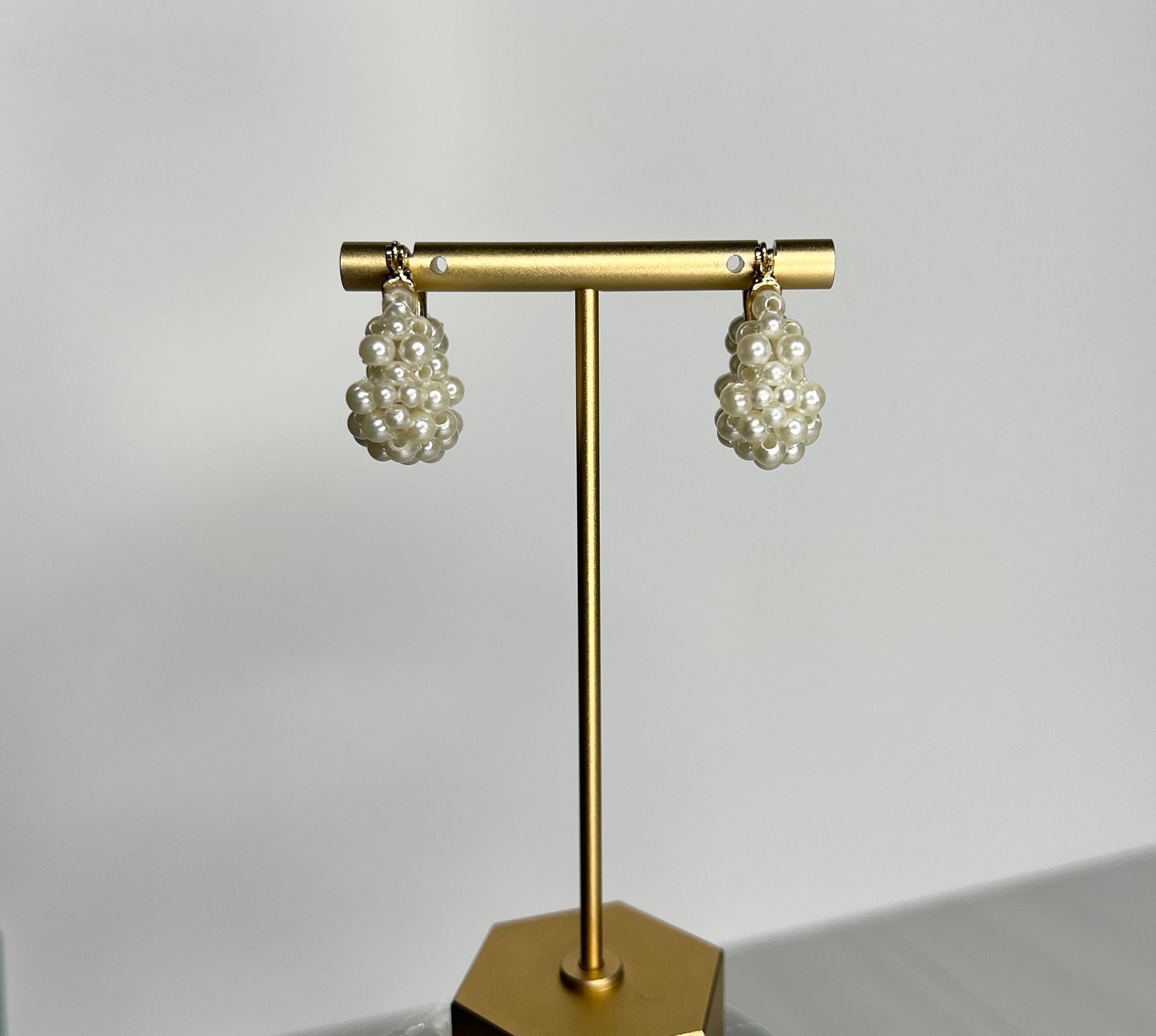 statement earrings perfect for the holidays. pearl hoop earrings. Gold and pearl hoops. pearl beaded hoop earrings