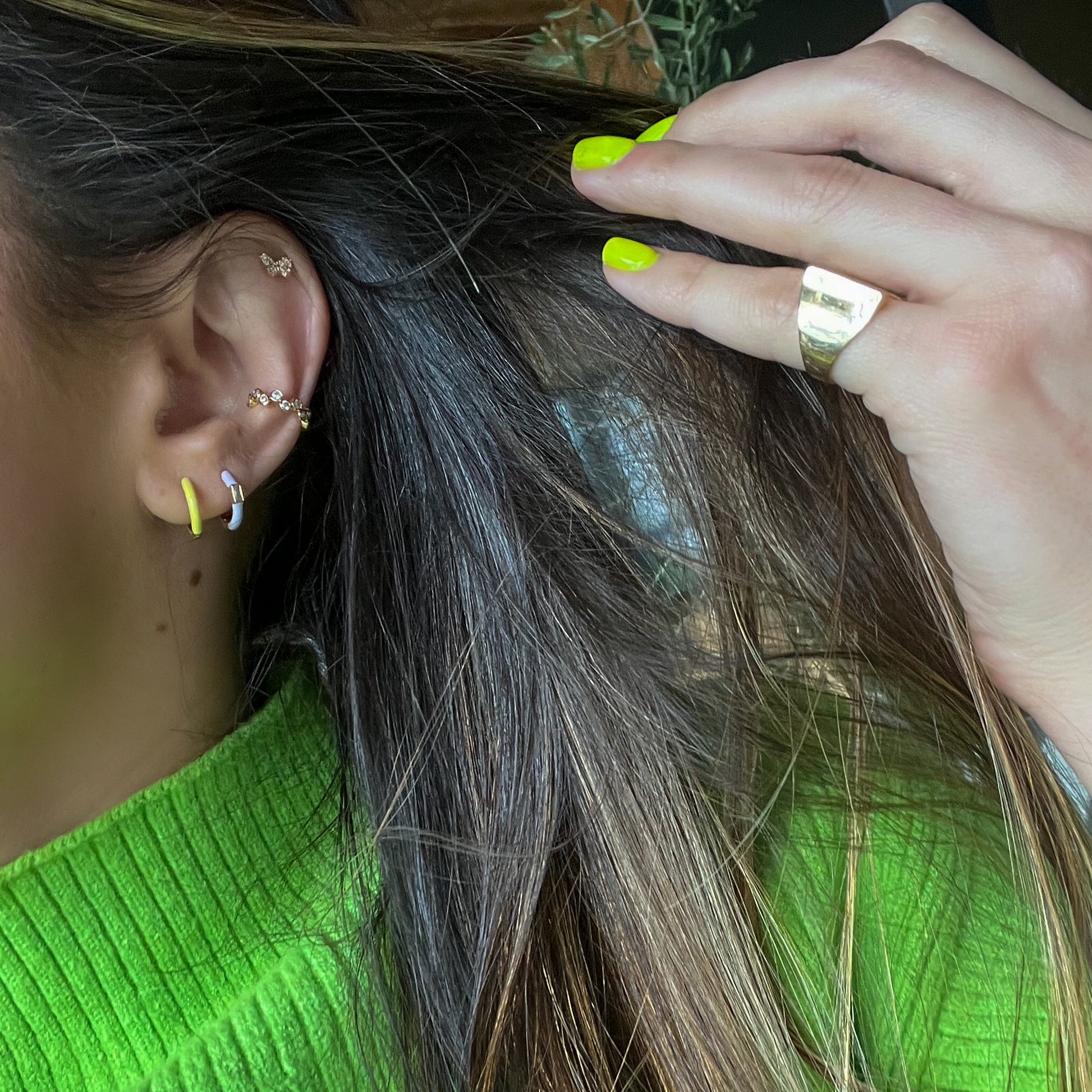 yellow enamel huggies. yellow hoop earrings. colorful hoops. colorful hoop earrings. enamel hoops. yellow huggies. bright earrings, colorful earring trends. yellow enamel jewelry. color earrings. fashion jewelry. affordable jewelry. enamel earrings. earring inspo. enamel hoops. fun earrings. earring inspo. yellow jewelry. huggie earrings. yellow earrings. enamel earring jewelry. yellow enamel hoop earrings. fashion earring style. everyday earrings. earring style. earring trends.
