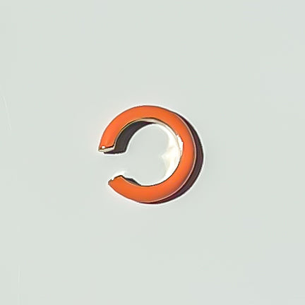 orange ear cuff. ear cuff. cuff earring. colorful earrings. enamel orange earrings. enamel ear cuff jewelry. orange ear cuff. fashion ear cuff. everyday earrings. earring style. earring trends