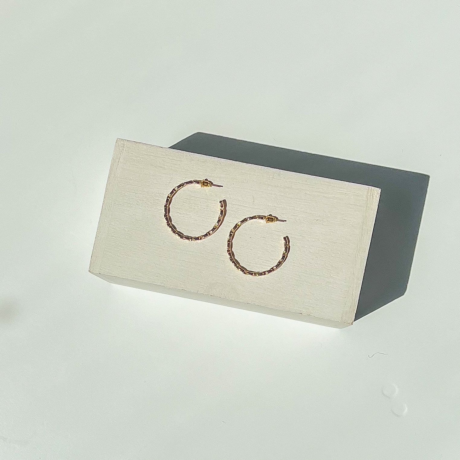 gold hoops. unique gold hoops.  diamond hoop earrings. hoop earrings. gold hoop earrings. chain hoops. gold and diamond earrings. gold statement earrings. special occasion earrings. jewelry to wear with black dress. earring shop. earrings to wear to wedding. earring style. trendy jewelry. earring trends. affordable earrings. diamond earrings. gold earrings. 18k gold filled earrings. earrings for women. jewelry brand. cool jewelry for women. gold hoops light weight
