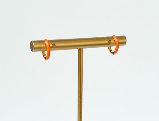 orange enamel huggies. orange hoop earrings. colorful hoops. colorful hoop earrings. enamel hoops. orange huggies. bright earrings, colorful earring trends. orange enamel jewelry. color earrings. fashion jewelry. affordable jewelry. enamel earrings. earring inspo. enamel hoops. fun earrings. earring inspo. orange jewelry. huggie earrings. orange earrings. enamel earring jewelry. orange enamel hoop earrings. fashion earring style. everyday earrings. earring style. earring trends.