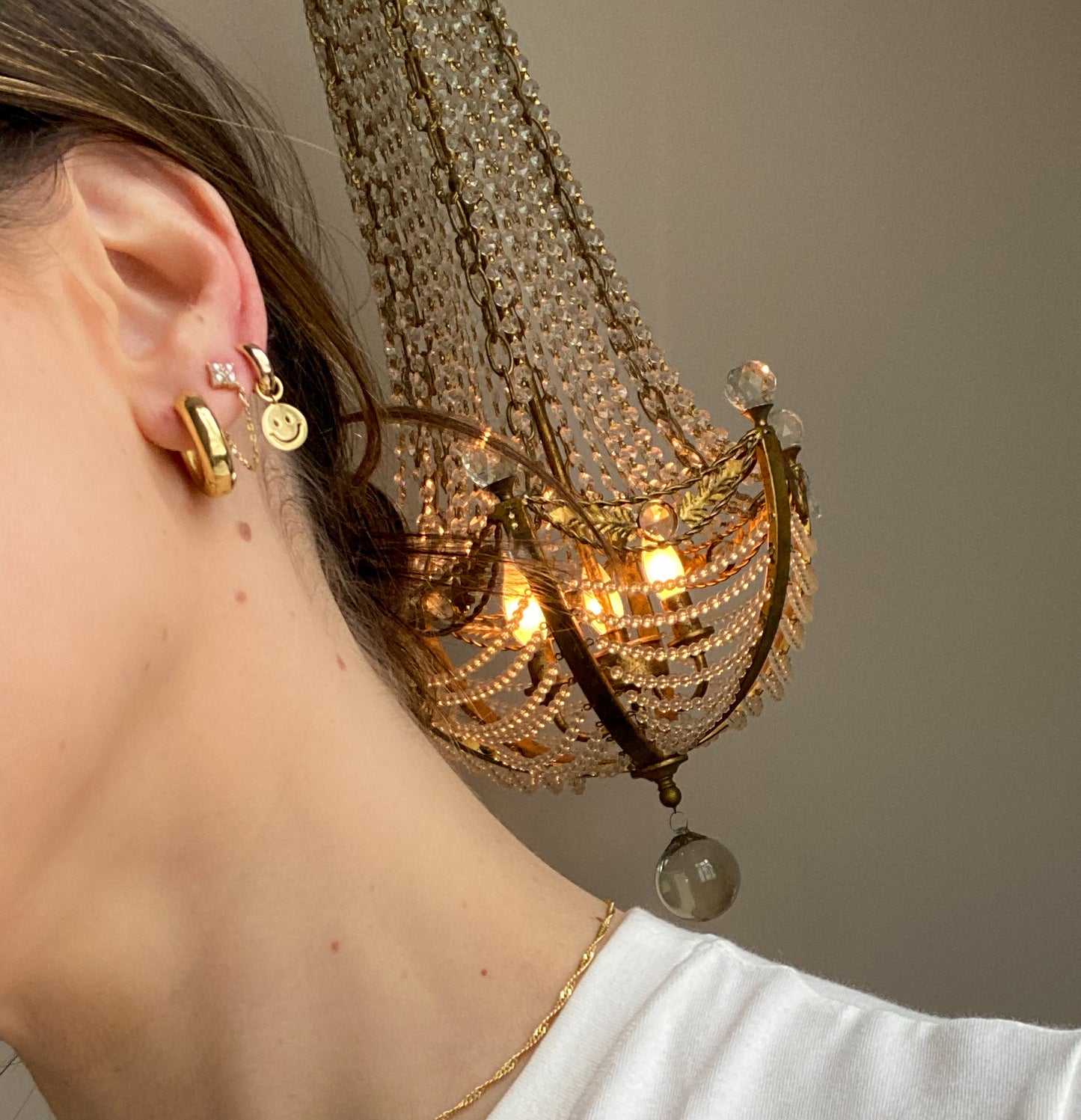24k gold filled hoops. chunky gold hoops. gold hoop earrings. earring stack with gold hoops, pearl stud and gold smiley face huggie