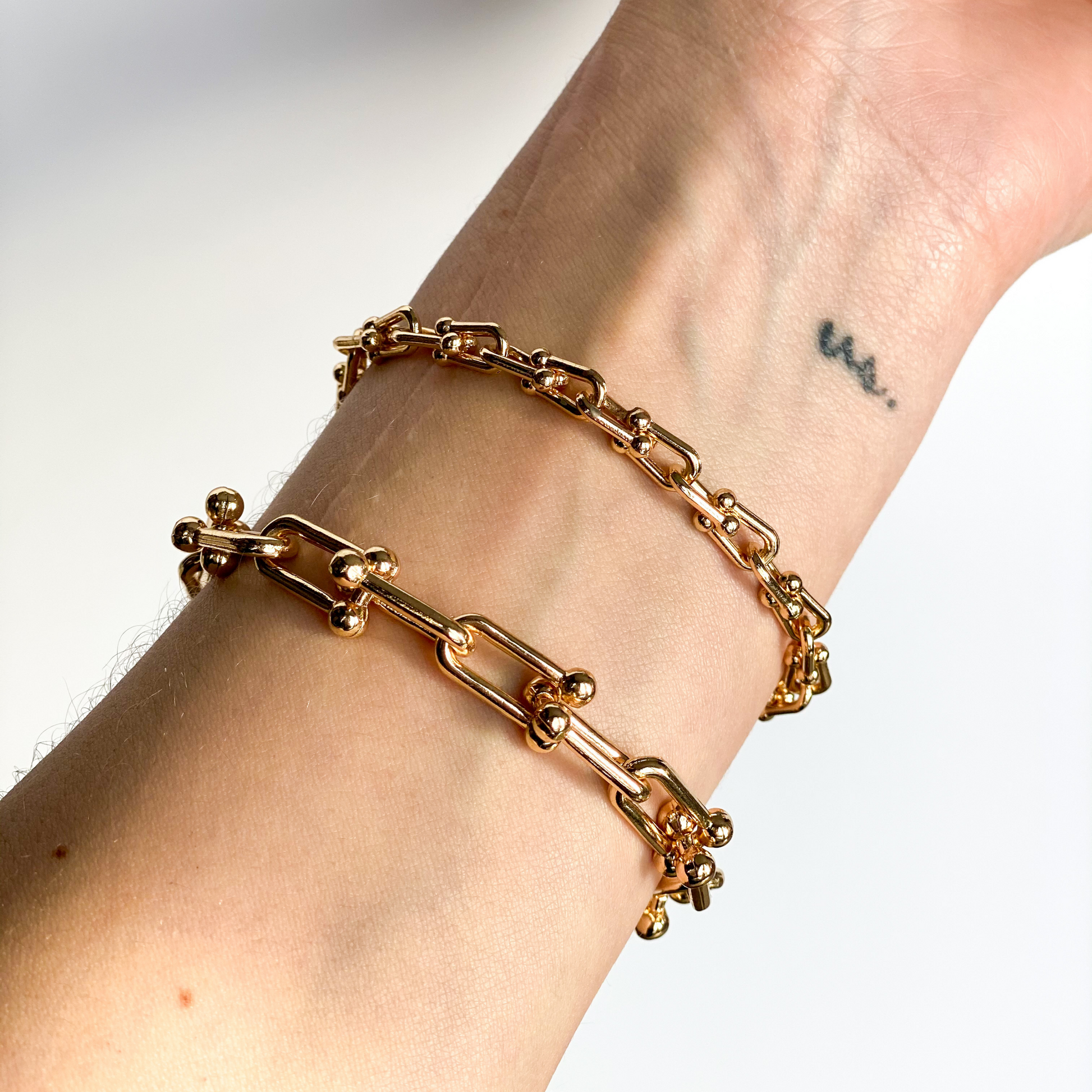 gold u link chain bracelets